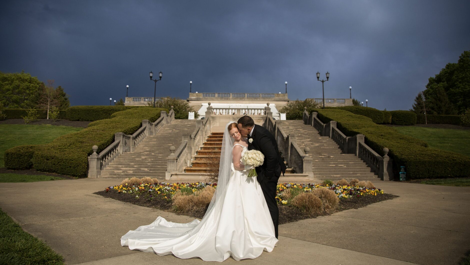 wedding portrait at ault park in front of staircase
